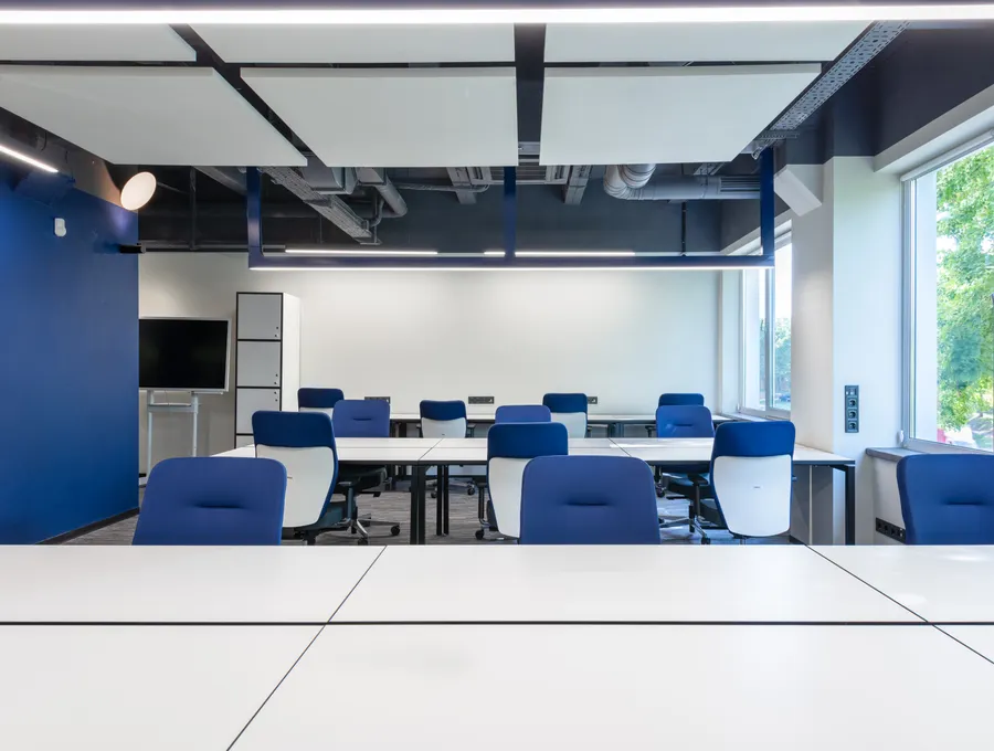 Clean modern office with desks and natural light